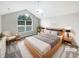 Serene bedroom featuring a large window, vaulted ceiling and soft, neutral tones at 2252 Carefree Cir # 3, Marietta, GA 30062