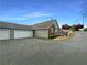 A well-maintained home with a two-car garage and a driveway leading to a beautiful yard at 2252 Carefree Cir # 3, Marietta, GA 30062