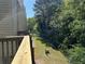 A lush backyard area from the view of a wood deck at 2939 Stonecrest Ln, Lithonia, GA 30038