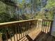 Sunny deck overlooking lush tree lined private backyard at 2939 Stonecrest Ln, Lithonia, GA 30038