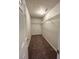 Walk-in closet with ample storage and shelving units, complemented by neutral walls and carpet flooring at 2939 Stonecrest Ln, Lithonia, GA 30038