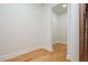A hallway with hardwood floors leading to other rooms in the home at 3365 Ardley Sw Rd, Atlanta, GA 30311