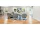 Bright living room with hardwood floors, gray furniture, stylish decor and abundant natural light at 3365 Ardley Sw Rd, Atlanta, GA 30311