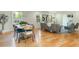 Open-concept living area blending dining and living spaces with hardwood floors and natural light at 3365 Ardley Sw Rd, Atlanta, GA 30311