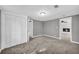 Bedroom features closet, neutral colors and fireplace through a pass-through door at 4301 Hidden Valley Rd, Decatur, GA 30035