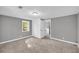 Neutral bedroom features a closet and a pass-through door to the kitchen at 4301 Hidden Valley Rd, Decatur, GA 30035