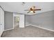 Bright bedroom with neutral walls and ceiling fan at 4301 Hidden Valley Rd, Decatur, GA 30035