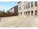 Large backyard with concrete patio and privacy fence at 4466 Woodland Bank Blvd, Buford, GA 30518