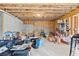 Unfinished basement with exposed ceiling, framing, and windows offers potential for customization at 4466 Woodland Bank Blvd, Buford, GA 30518