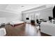 This spacious main bedroom features hardwood floors, tray ceilings and plenty of natural light at 4466 Woodland Bank Blvd, Buford, GA 30518