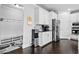 Mudroom area with hooks, storage, and easy access to the kitchen at 4466 Woodland Bank Blvd, Buford, GA 30518