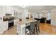 Kitchen view with a breakfast bar and seating at 5381 Fawn Meadow Ln, Powder Springs, GA 30127