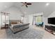 Spacious bedroom features vaulted ceilings, plush carpet, and a king bed with decorative pillows at 5381 Fawn Meadow Ln, Powder Springs, GA 30127