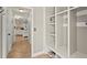Hallway view with a mud room featuring built-in cubbies and seating at 5381 Fawn Meadow Ln, Powder Springs, GA 30127