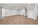 Finished basement with neutral walls and floors and recessed lighting at 3860 Rajean Dr, Lawrenceville, GA 30044