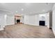 A finished basement with a decorative fireplace and modern flooring at 3860 Rajean Dr, Lawrenceville, GA 30044
