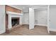 Basement features a brick fireplace, white trim, and adjacent closet space at 3860 Rajean Dr, Lawrenceville, GA 30044