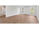 Spacious basement with light-colored walls, flooring, staircase, and access to the backyard at 3860 Rajean Dr, Lawrenceville, GA 30044