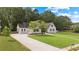 Lovely home featuring a well-manicured lawn and long driveway at 3860 Rajean Dr, Lawrenceville, GA 30044