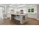 Kitchen featuring stainless appliances, white cabinetry, granite countertops, and recessed lighting at 3860 Rajean Dr, Lawrenceville, GA 30044