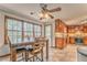 Open-concept kitchen and eat-in dining area with lots of natural light at 4327 Saint Michaels Dr, Lilburn, GA 30047