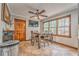 Cozy eat-in dining area with ceiling fan and natural light at 4327 Saint Michaels Dr, Lilburn, GA 30047