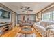 Inviting living room with hardwood floors and lots of seating at 4327 Saint Michaels Dr, Lilburn, GA 30047