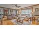 Spacious living room with hardwood floors and plenty of seating, perfect for entertaining at 4327 Saint Michaels Dr, Lilburn, GA 30047