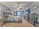 Spacious main bedroom with sitting area, TV and ensuite bath at 4327 Saint Michaels Dr, Lilburn, GA 30047