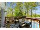 Cozy back deck with wicker seating overlooking the swimming pool at 503 Duke Dr, Marietta, GA 30066