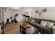 Basement living room with workout area, gray sofa, and wood-look floors at 503 Duke Dr, Marietta, GA 30066