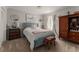 Cozy bedroom boasts neutral tones, carpet flooring, and comfortable furnishings at 503 Duke Dr, Marietta, GA 30066