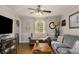 Inviting living room featuring hardwood floors, comfortable seating and neutral wall color at 503 Duke Dr, Marietta, GA 30066