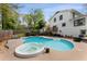 Inviting backyard oasis featuring a private pool, spa, and spacious patio for outdoor living at 503 Duke Dr, Marietta, GA 30066