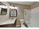 Bathroom featuring a vanity, a toilet and tub/shower combination at 955 Laurel Mill Dr, Roswell, GA 30076