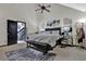 Bright and spacious bedroom with walkout access, a plush bed, and stylish decor at 2451 Cedar Fork Trl, Marietta, GA 30062