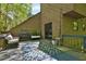 Cozy outdoor deck area with comfortable seating, perfect for relaxing and enjoying the outdoors at 2451 Cedar Fork Trl, Marietta, GA 30062