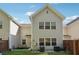 Exterior view of the home's backyard with green grass and privacy fence at 2894 Cross Creek Dr, Cumming, GA 30040