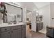 Open view of a Jack-and-Jill bathroom with dual sinks, vanities, and a shared shower area at 2894 Cross Creek Dr, Cumming, GA 30040