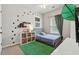 Cozy bedroom with a dinosaur theme and decorative touches at 2894 Cross Creek Dr, Cumming, GA 30040