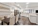 Bright kitchen features granite countertops, stainless steel appliances, and an eat in dining area at 2894 Cross Creek Dr, Cumming, GA 30040