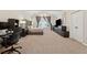 Spacious main bedroom features a vaulted ceiling, large windows, and an office space at 2894 Cross Creek Dr, Cumming, GA 30040