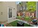 Outdoor patio featuring seating, privacy fence, and a door into the home at 2894 Cross Creek Dr, Cumming, GA 30040