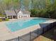 Community pool featuring a large in-ground pool with a covered sitting area at 2894 Cross Creek Dr, Cumming, GA 30040