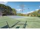 Community tennis court provides a great outdoor recreation space on sunny days at 2894 Cross Creek Dr, Cumming, GA 30040