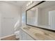 Bathroom with double sinks, vanity with a large mirror, toilet, and bathtub shower combo at 5013 Centennial Commons Nw Dr, Acworth, GA 30102