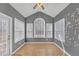 Sunroom with ample natural light, neutral walls, and multiple windows, offering a serene space at 5013 Centennial Commons Nw Dr, Acworth, GA 30102