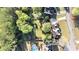 Spacious lot with mature trees, a fenced yard, a pool, utility shed, and plenty of privacy at 60 Bartlett Way, Dallas, GA 30157