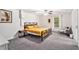 Bedroom features a modern metal bed frame, side table, and lots of light at 60 Bartlett Way, Dallas, GA 30157