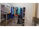 Walk-in closet with clothes and shelves at 60 Bartlett Way, Dallas, GA 30157